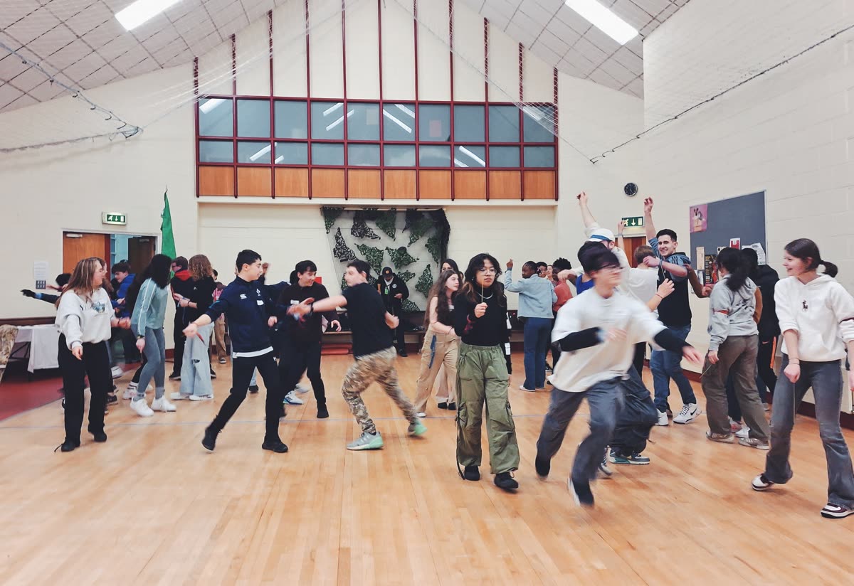 Secondary school students in an energetic True Talks session